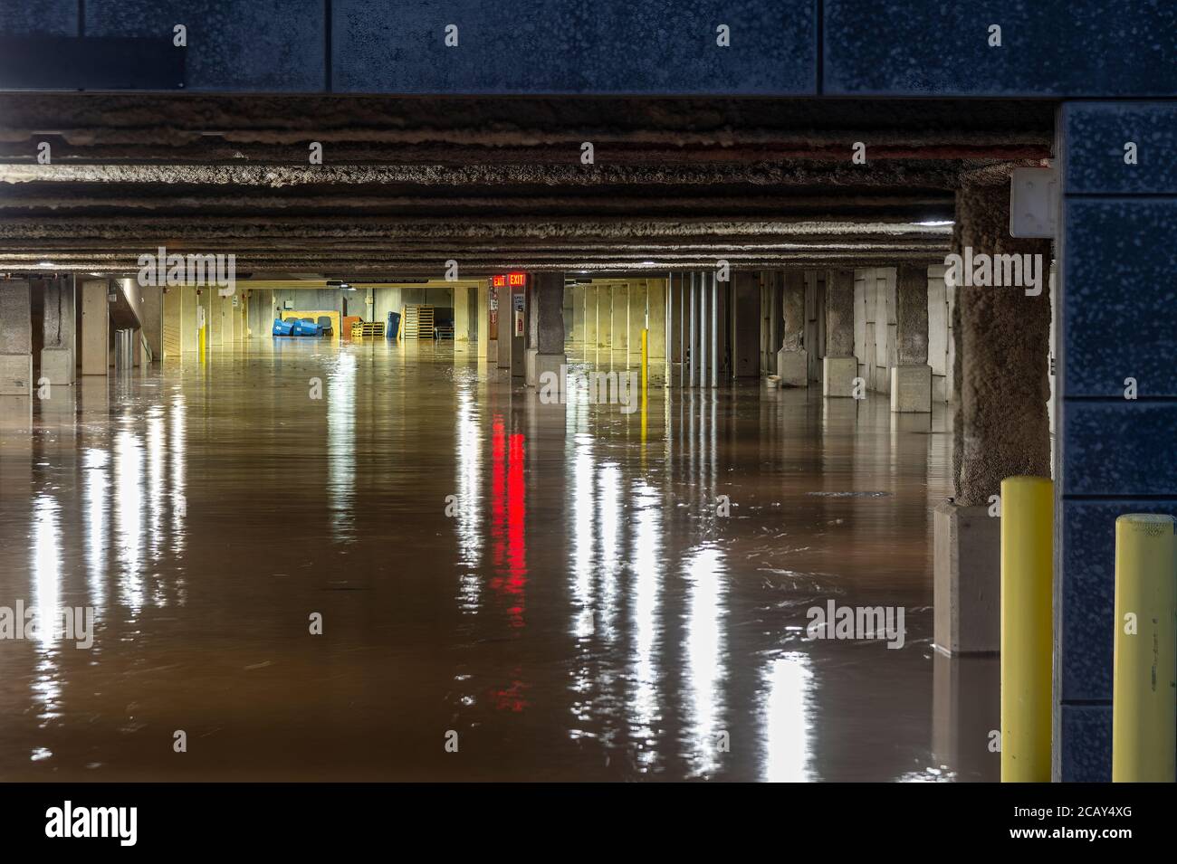 Interior of flooded parking garage Stock Photo