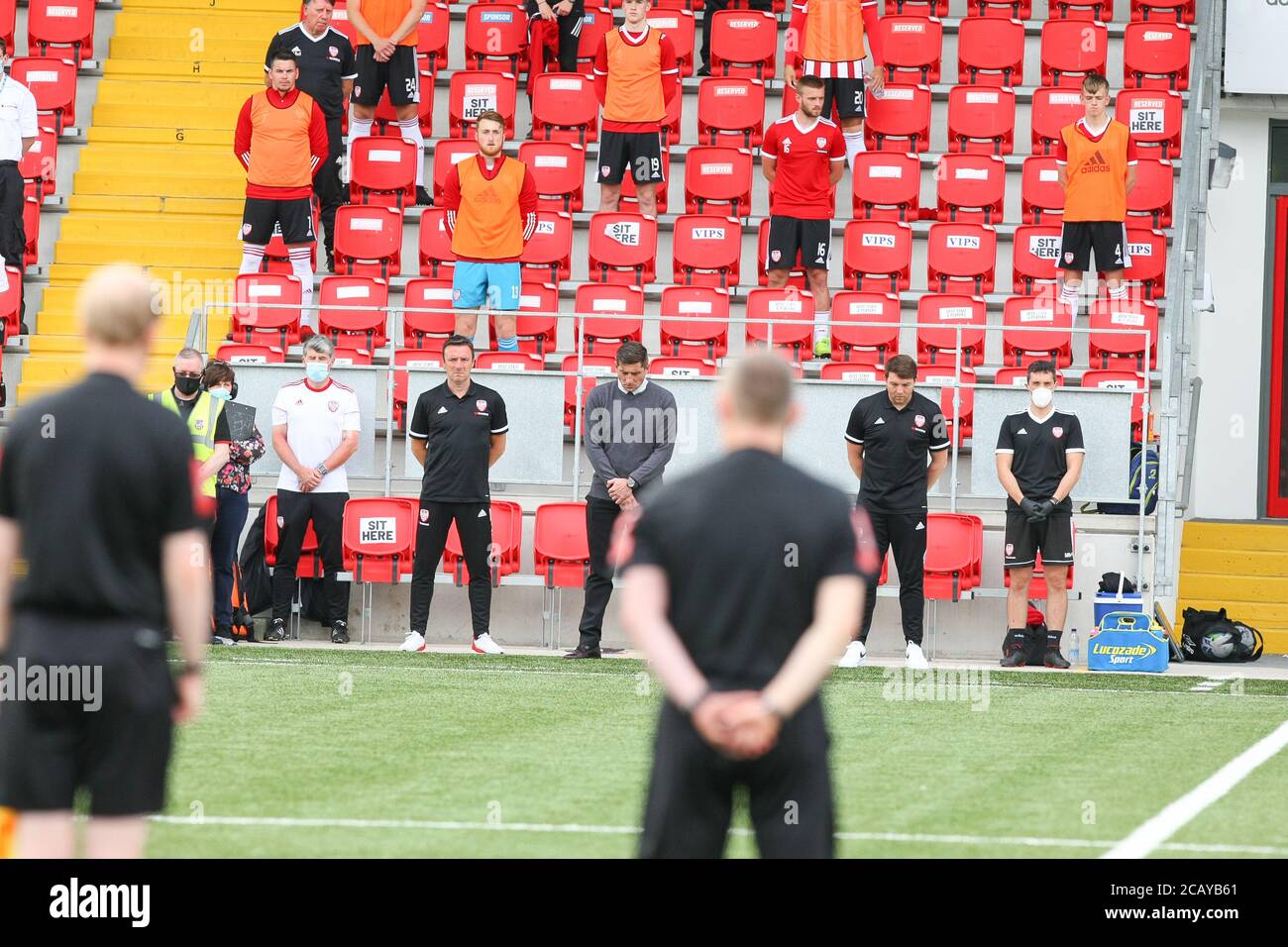 DECLAN DEVINE Derry City FC manager and the rest of the backroom team in a minutes silence in memory of John Hume before the Airtricity League fixture Stock Photo