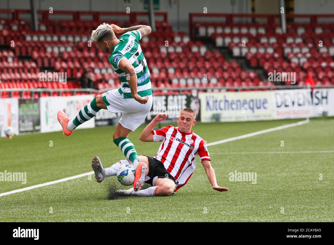JACK MALONE (Derry City FC) getting a well timed tackle on Lee Grace (Shamrock Rovers) during  Airtricity League fixture between  Derry City FC & Sham Stock Photo