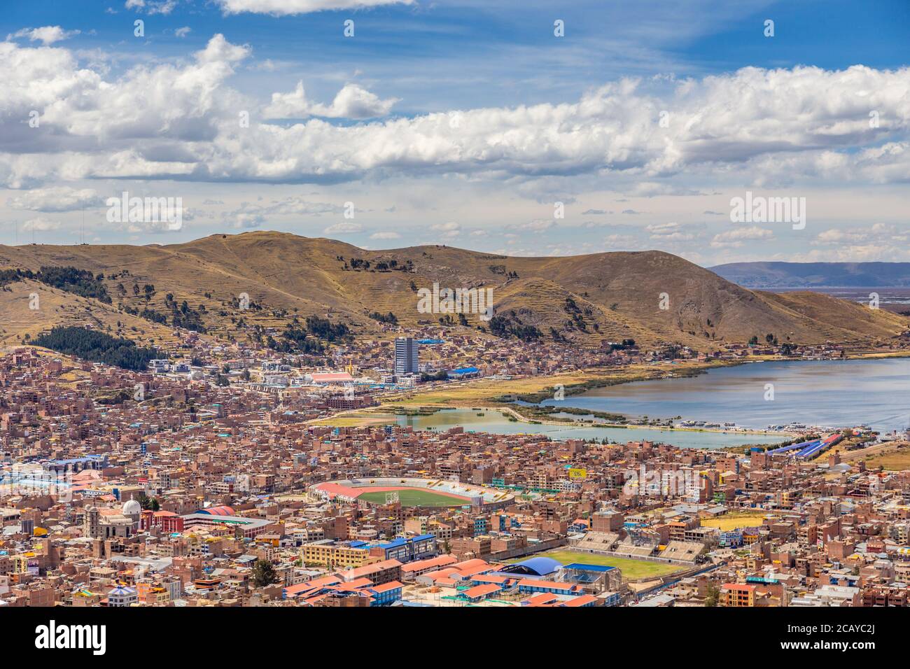 Panorama of peruvian city Puno and lake Titicaca, Peru Stock Photo