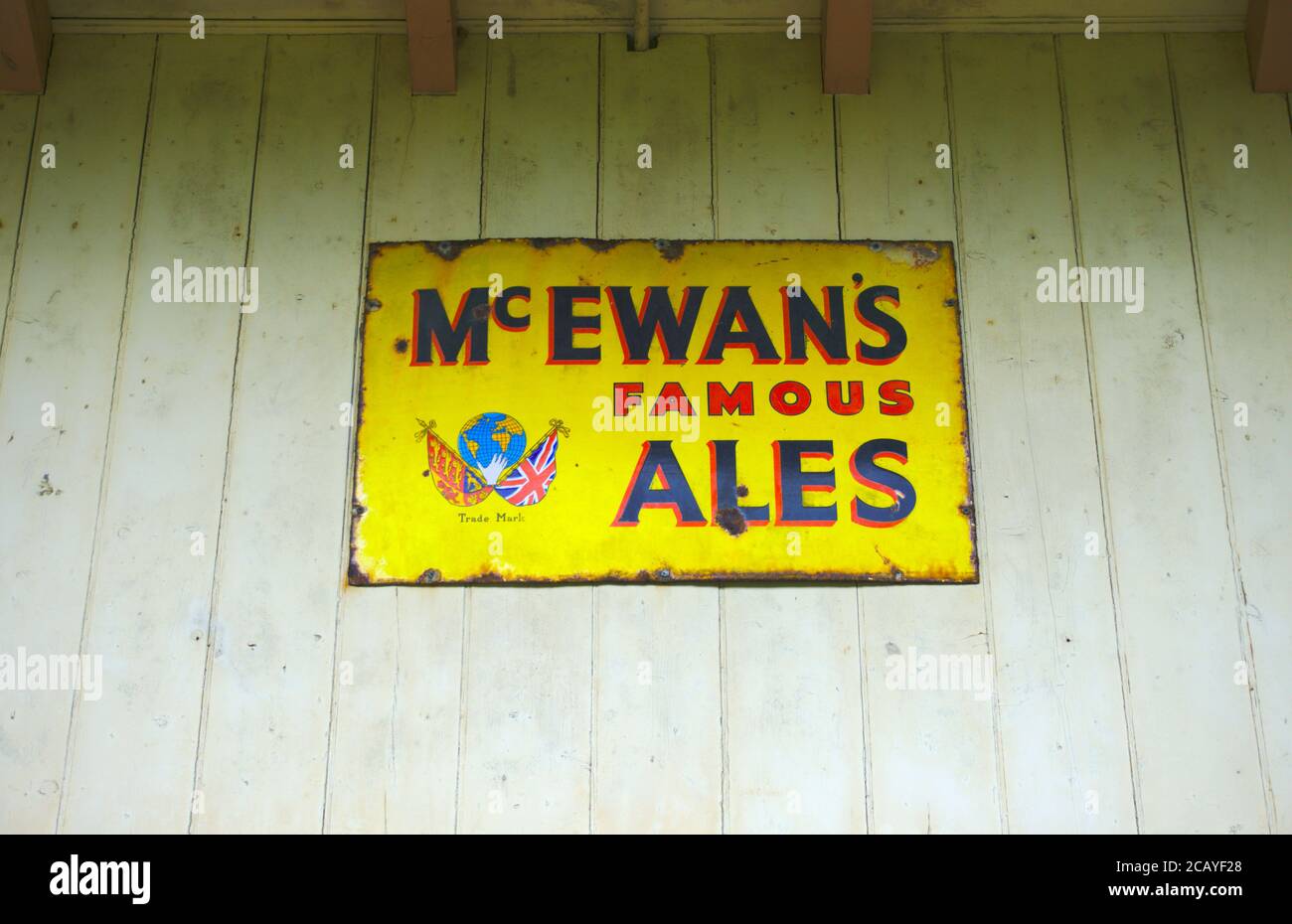 Vintage metal advertising plate for McEwan's Famous Ales, Melrose railway station, Roxburghshire, Scottish Borders, UK. Stock Photo