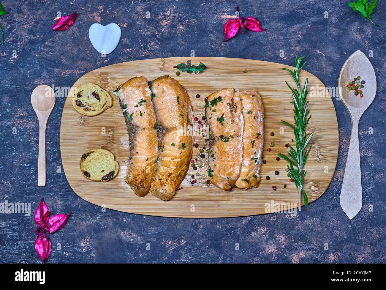 A wood dish with a salmon to dinner today Stock Photo