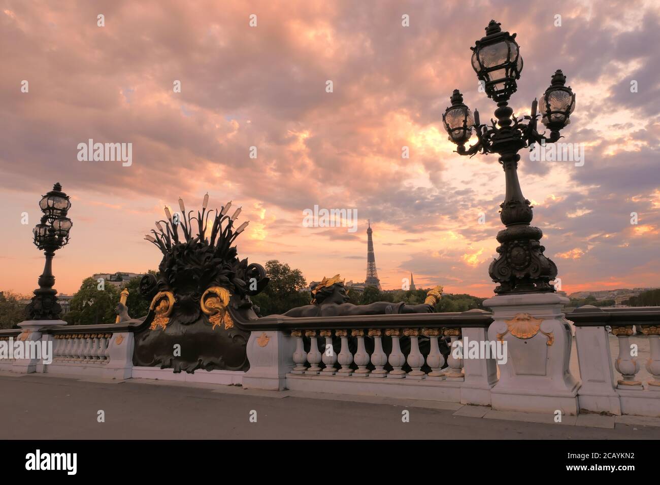 Paris, France. August 08. 2020. Sunset on the famous Alexander 3 Bridge. Historic retro-style lampposts. Very touristy place. Stock Photo