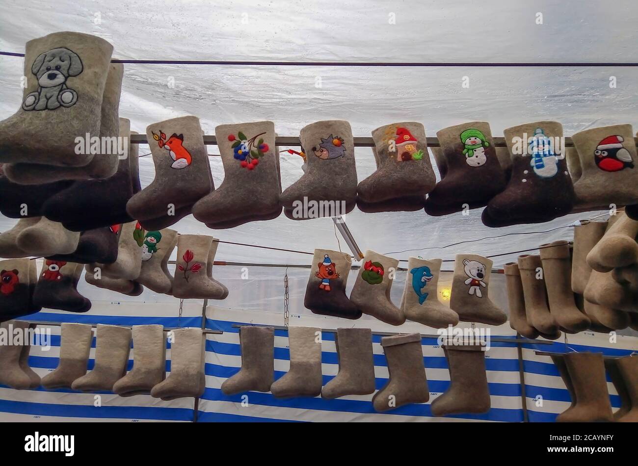 Felt boots on market stand. Valenki are traditional Russian winter footwear Stock Photo Alamy