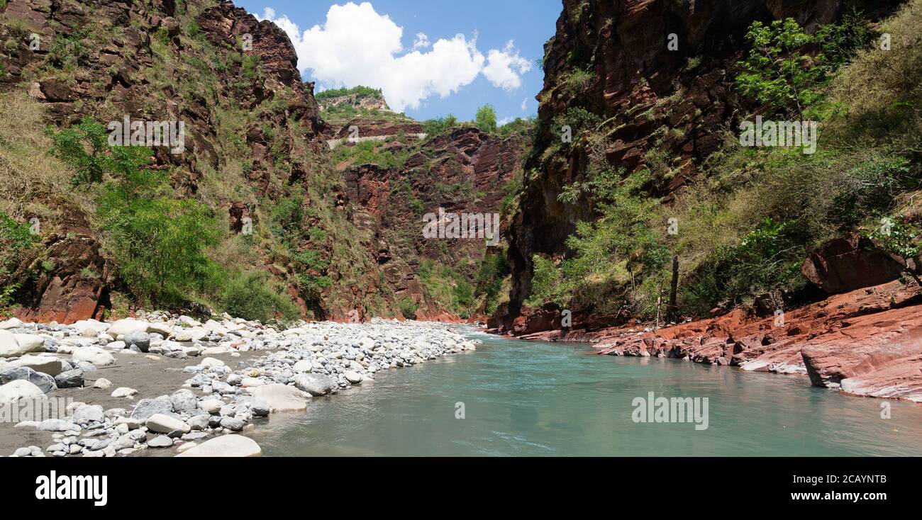 Var river and red stones at the bottom of Daluis Canyon or Daluis gorge. Alpes Maritimes, France during summer Stock Photo