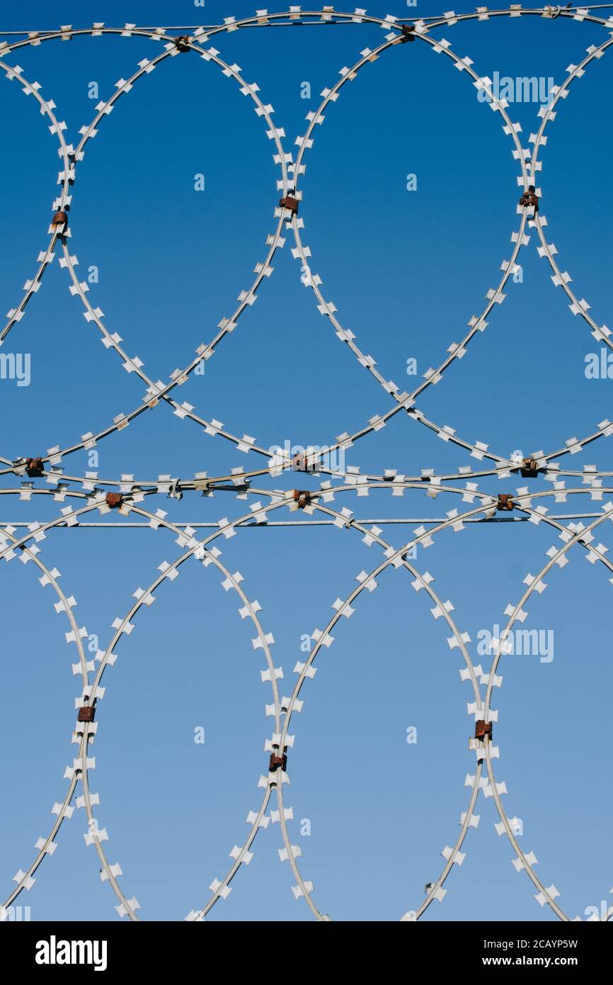 barbed wire fence used for protection purposes Stock Photo - Alamy