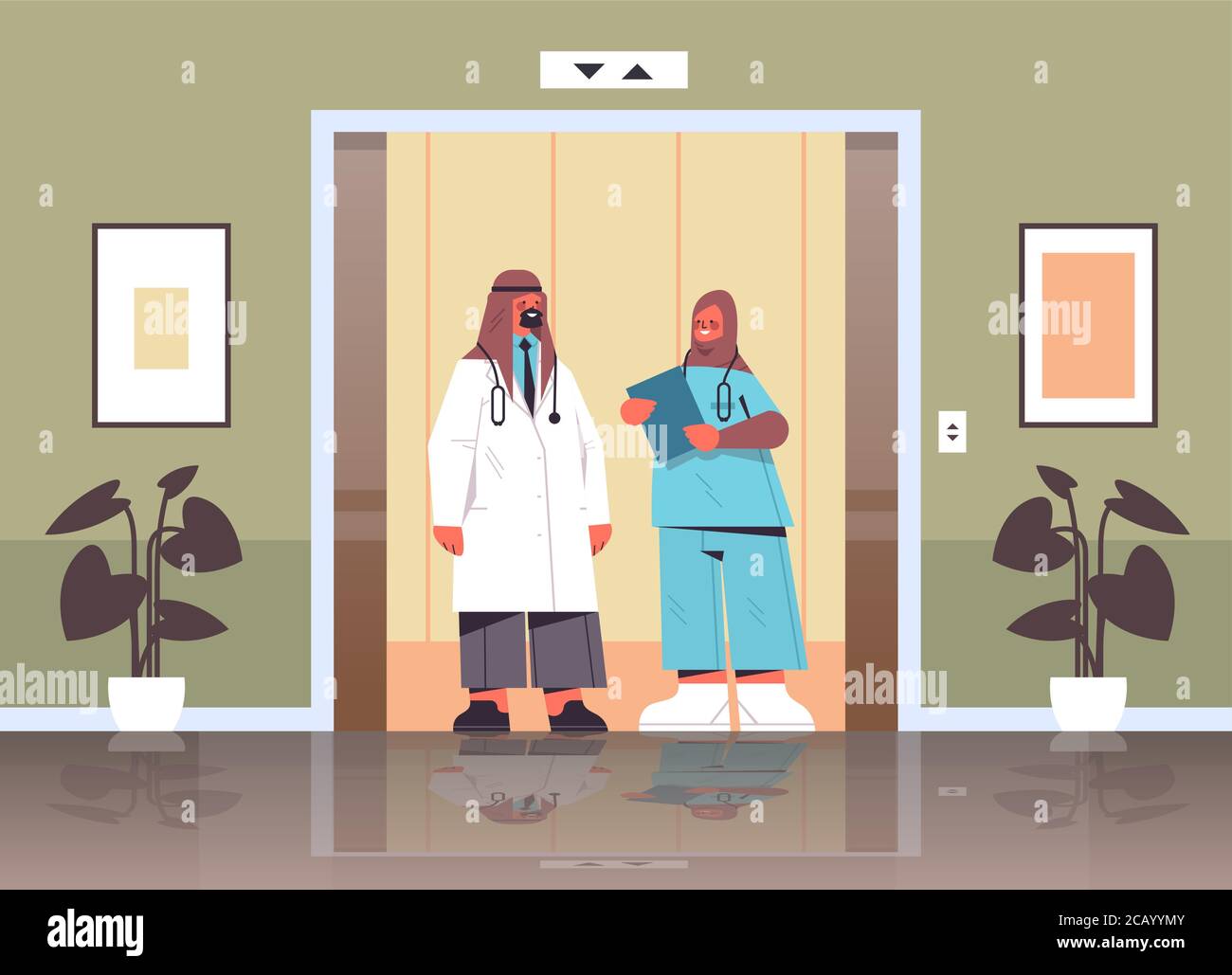 arabic medical workers discussing during meeting in hospital elevator ...
