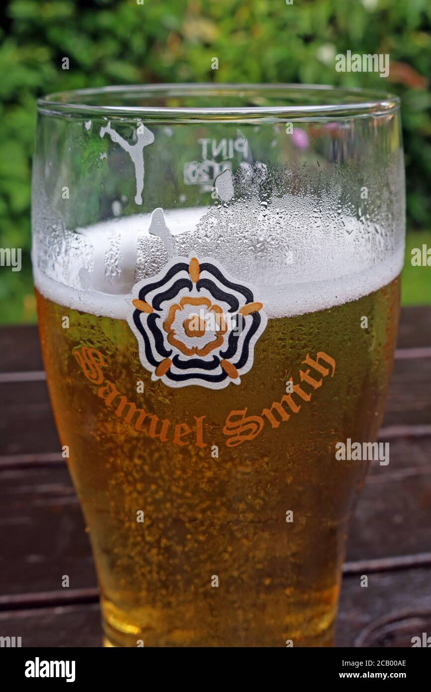 Sam Smiths Cider,Samual Smiths Cider in a beer garden,expensive after lockdown,Cheshire,England,UK Stock Photo