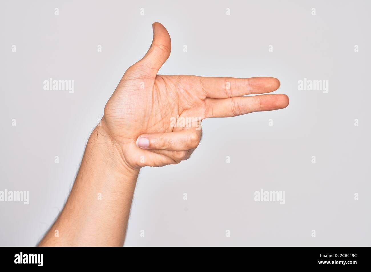 Hand of caucasian young man showing fingers over isolated white ...