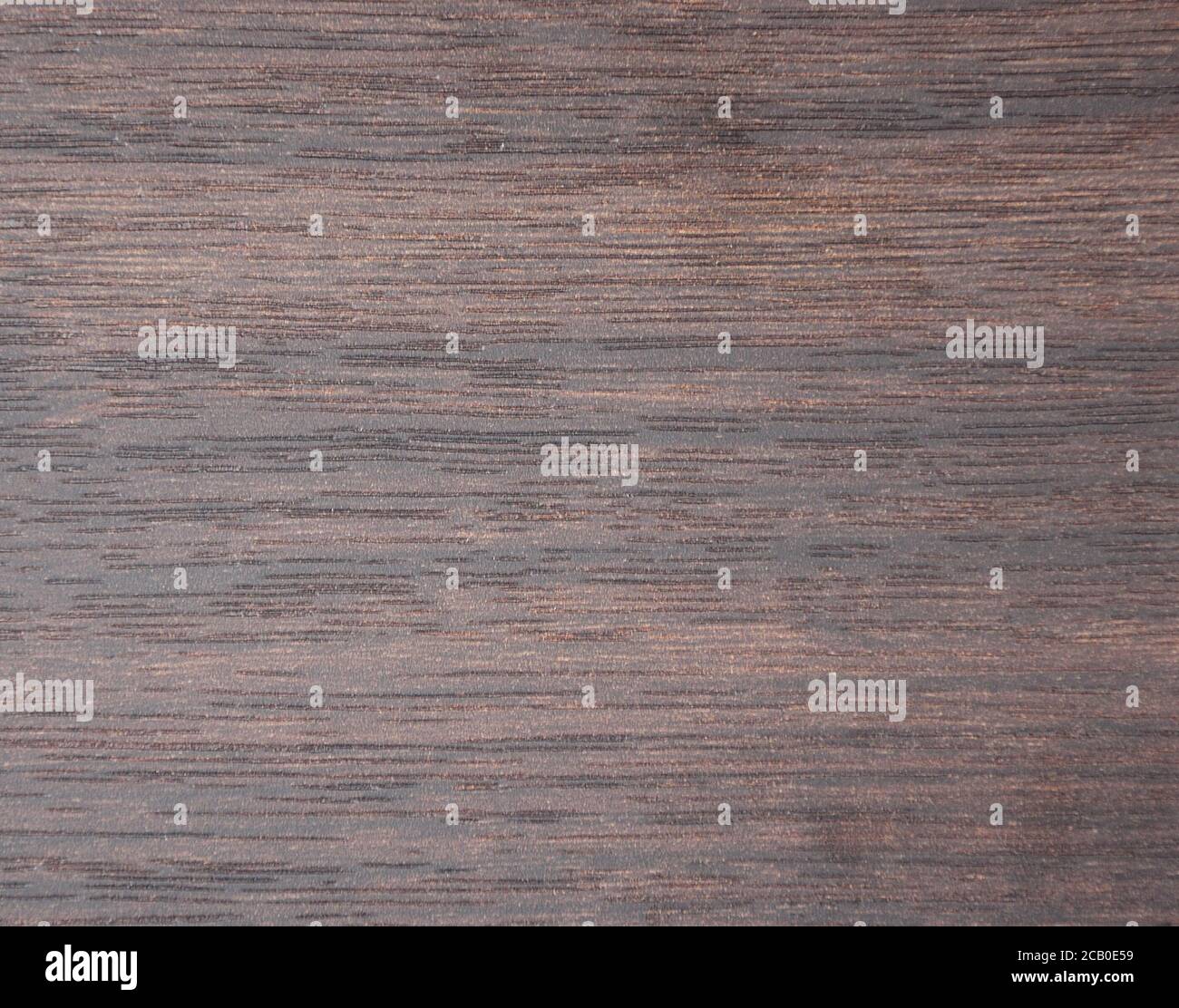 Dark walnut, natural wood grain close-up. Background, texture Stock
