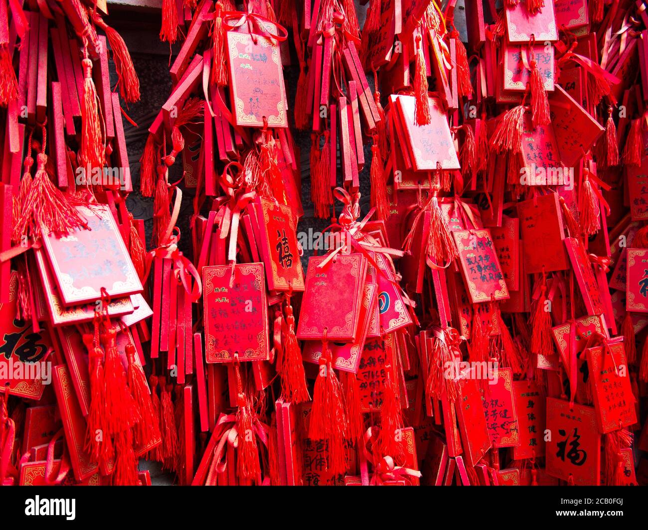 Red lucky charms hanging in Confucius temple in Longmen Grottoes World Heritage Site in Luoyang City, Henan Province, China, 14th October 2018. Stock Photo