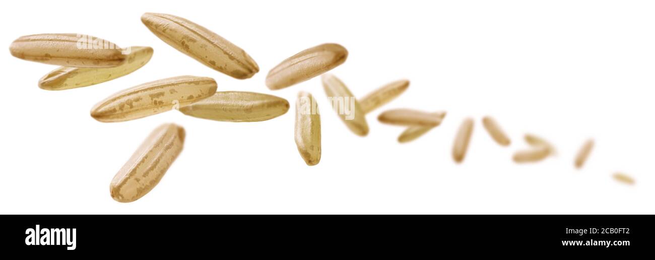 Raw rice levitates on a white background Stock Photo - Alamy