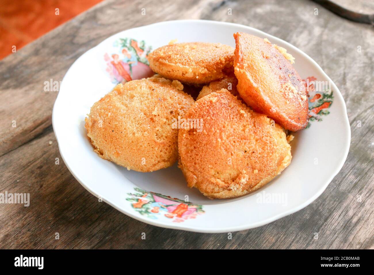 Apem, Apam or Appam, is tradional snack or food from indonesia. Made from rice flour, eggs, coconut milk, sugar and tape and a little salt and then bu Stock Photo