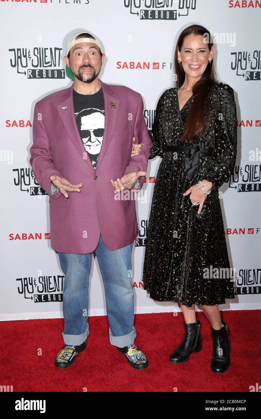 LOS ANGELES - OCT 15:   Kevin Smith, Jennifer Schwalbach Smith at the 'Jay & Silent Bob Reboot' Los Angeles Premiere at the TCL Chinese Theater on October 15, 2019 in Los Angeles, CA Stock Photo