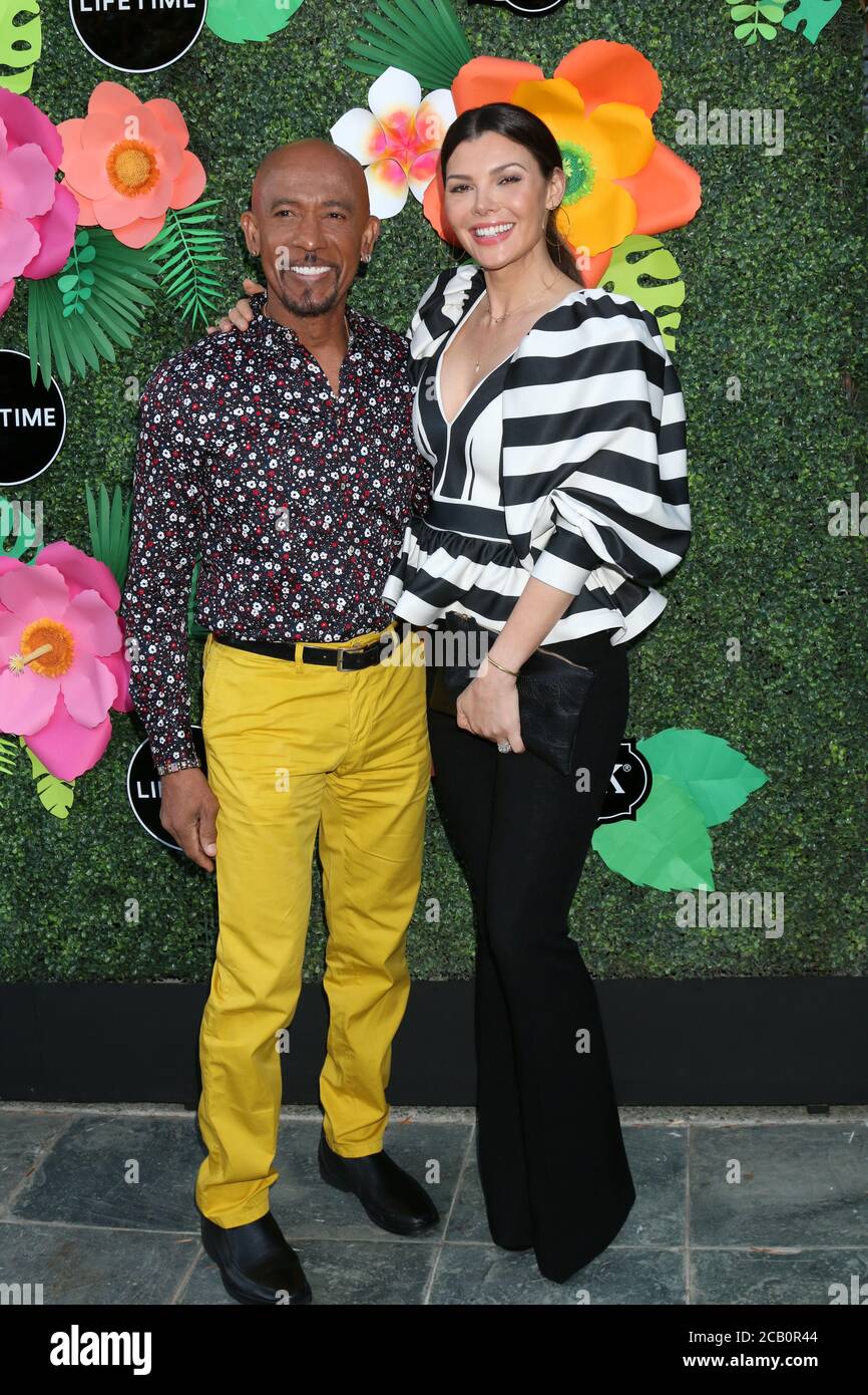 LOS ANGELES - MAY 20:  Montel Williams, Ali Landry at the Lifetime TV Summer Luau at the W Hotel on May 20, 2019 in Westwood, CA Stock Photo