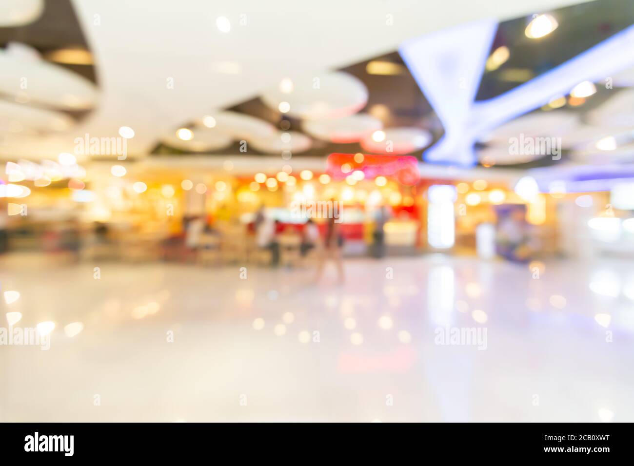 Abstract blur lights in retail shop mall background. Interior clean supermarket lifestyle concept for city store billboard, consumer way modern market Stock Photo