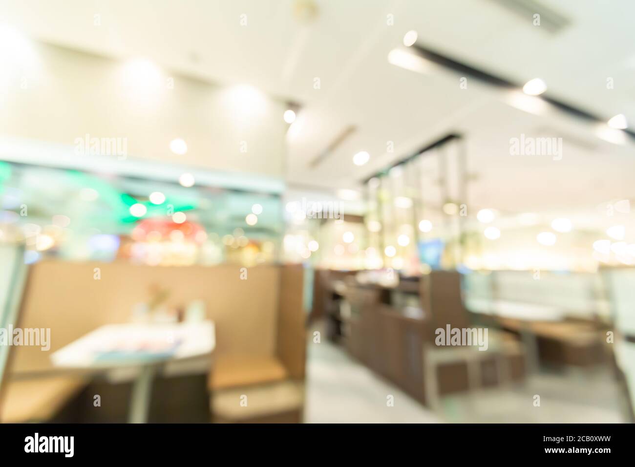 Abstract blur lights in retail shop mall background. Interior clean supermarket lifestyle concept for city store billboard, consumer way modern market Stock Photo