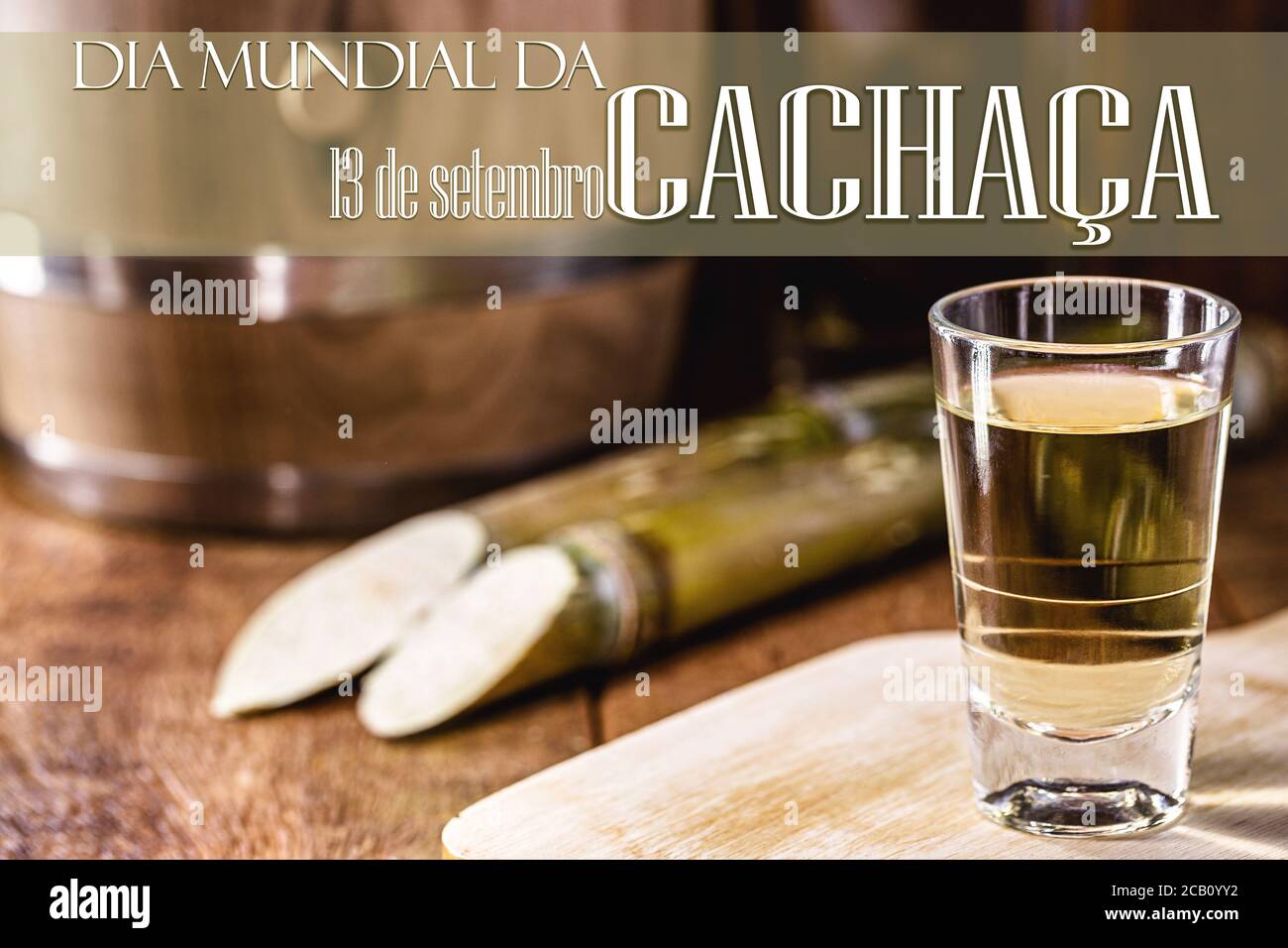 Typical distilled drink from Brazil, called "pinga" or cachaça ", text