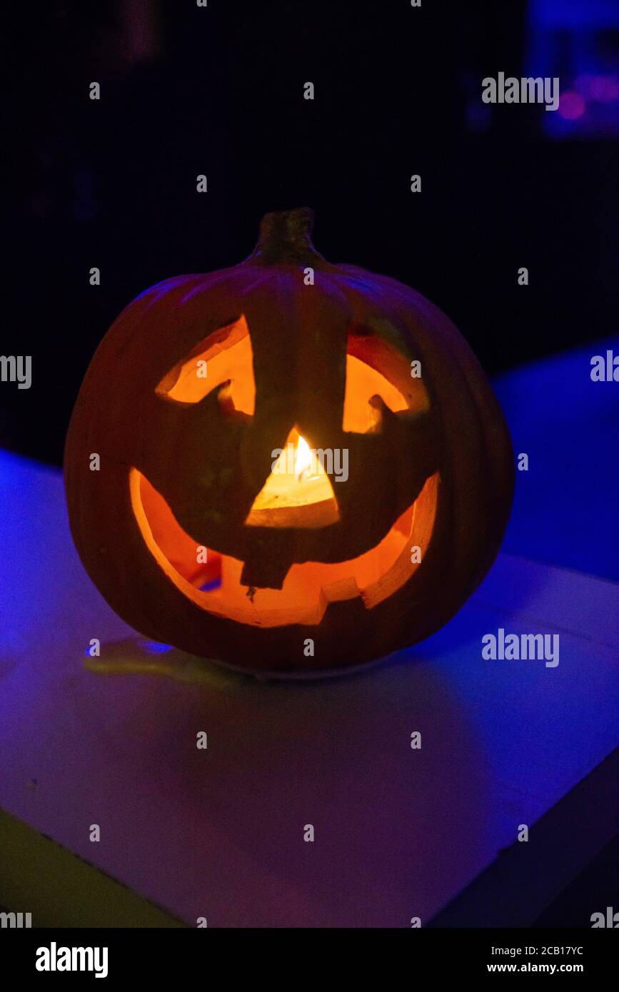 halloween pumpkin worked with candle inside Stock Photo Alamy
