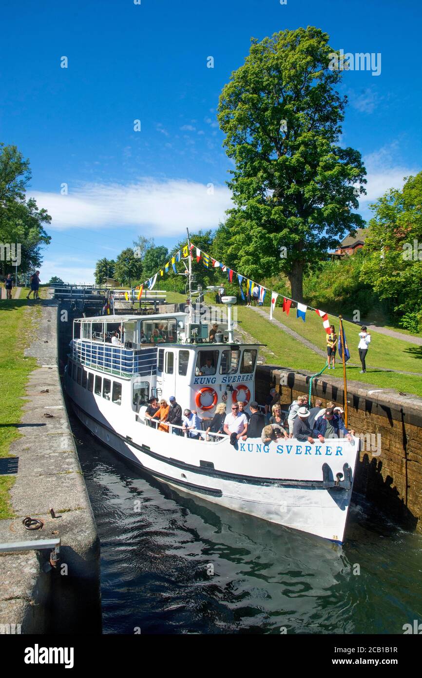 The old passenger boat Kung Sverker in a lock on the Gota Canal at Borenshult, Ostergotland, Sweden Stock Photo