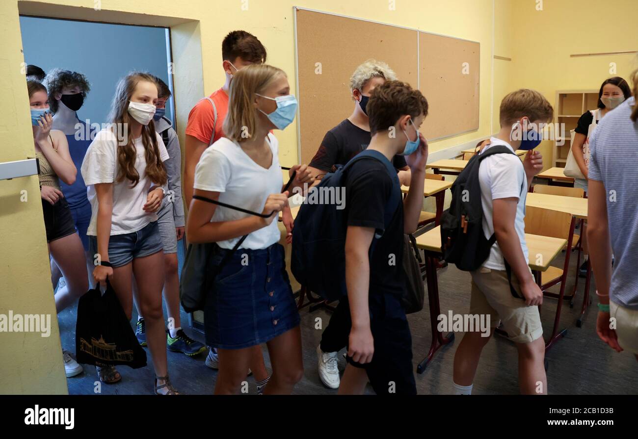Pupils of the protestant high school "Zum Grauen Kloster" arrive to lesson  on the first day after the summer holidays, amid the coronavirus disease  (COVID-19) pandemic, in Berlin, Germany, August 10, 2020.