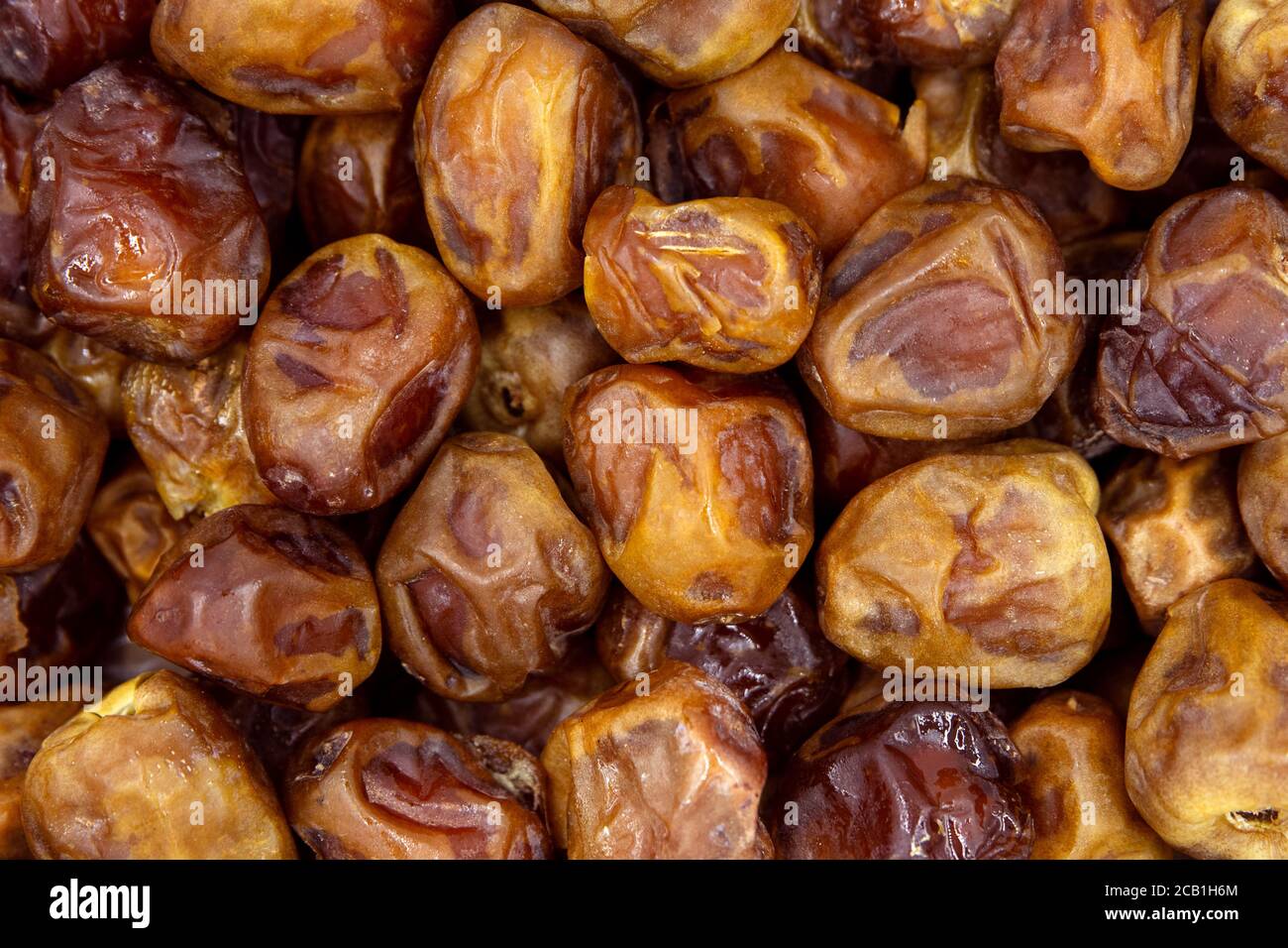 Dried dates background, sort soft sukkary or sukari, vegan sweet superfood, topview Stock Photo