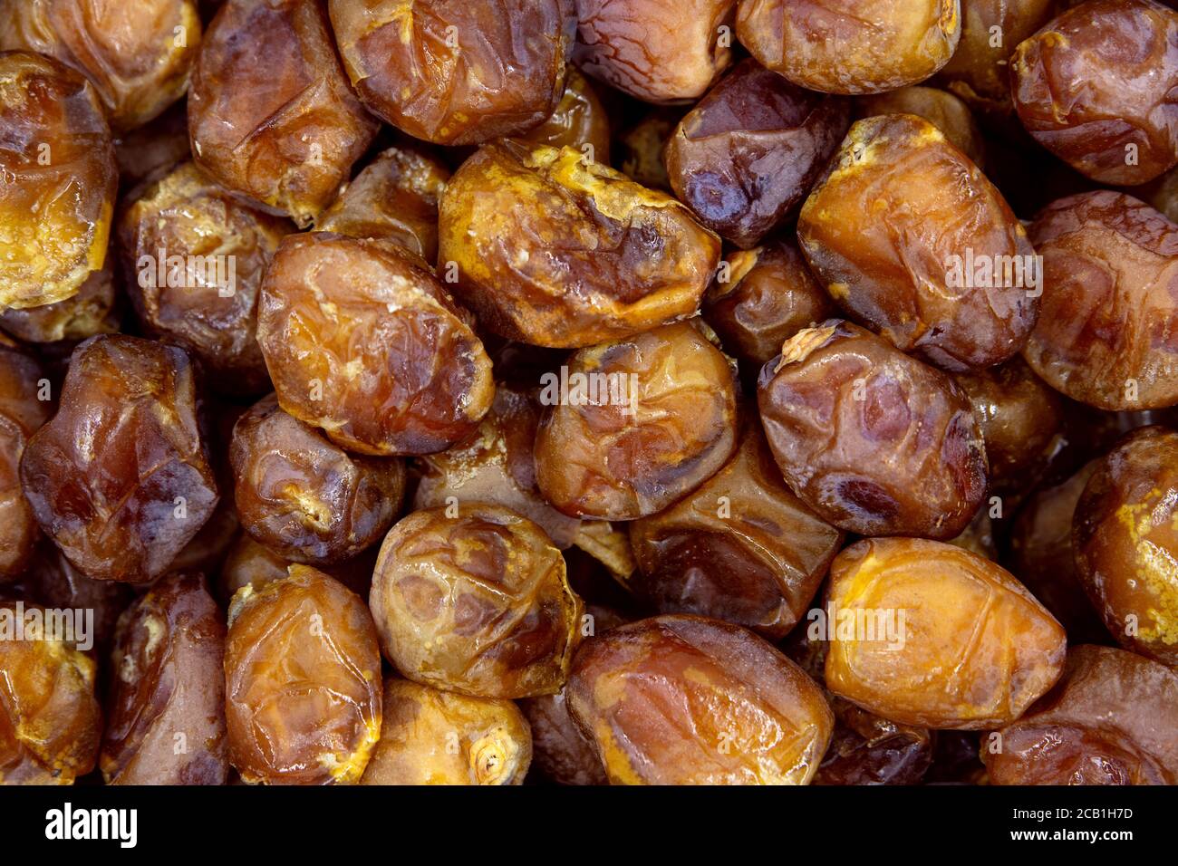 Dried dates background, sort soft bawalini, vegan sweet superfood, topview Stock Photo