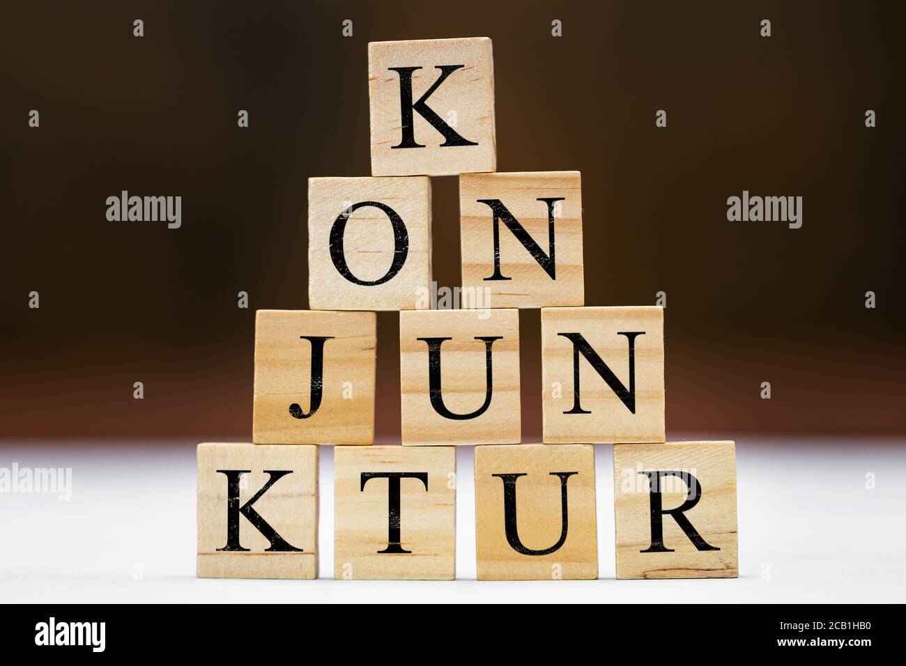 Wooden blocks with german word konjunktur with means conjuncture, stumulus package and finance Stock Photo