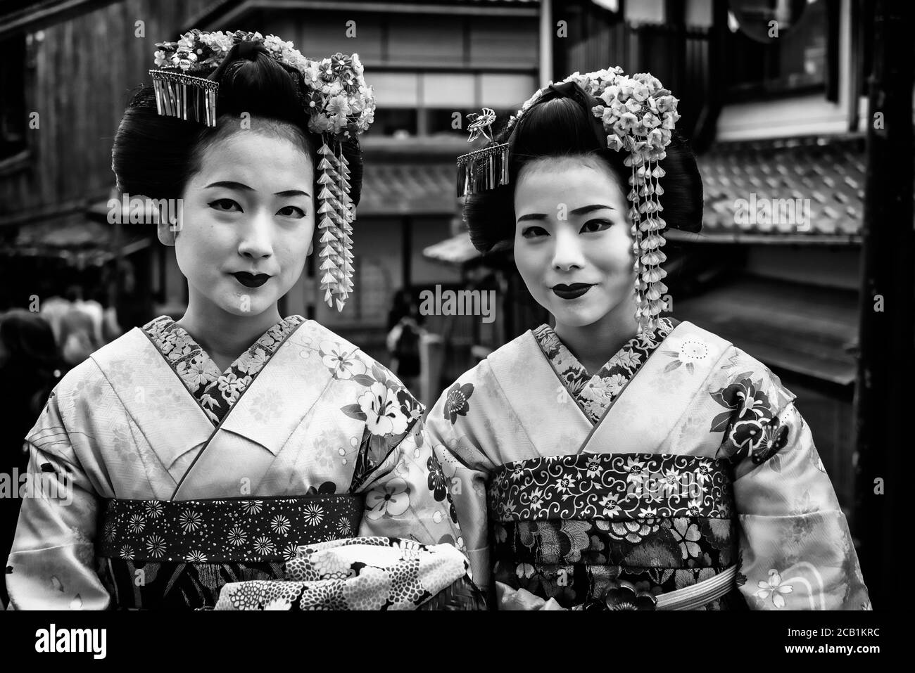 Portrait of Geisha and young Maiko in Kyoto, Japan Stock Photo