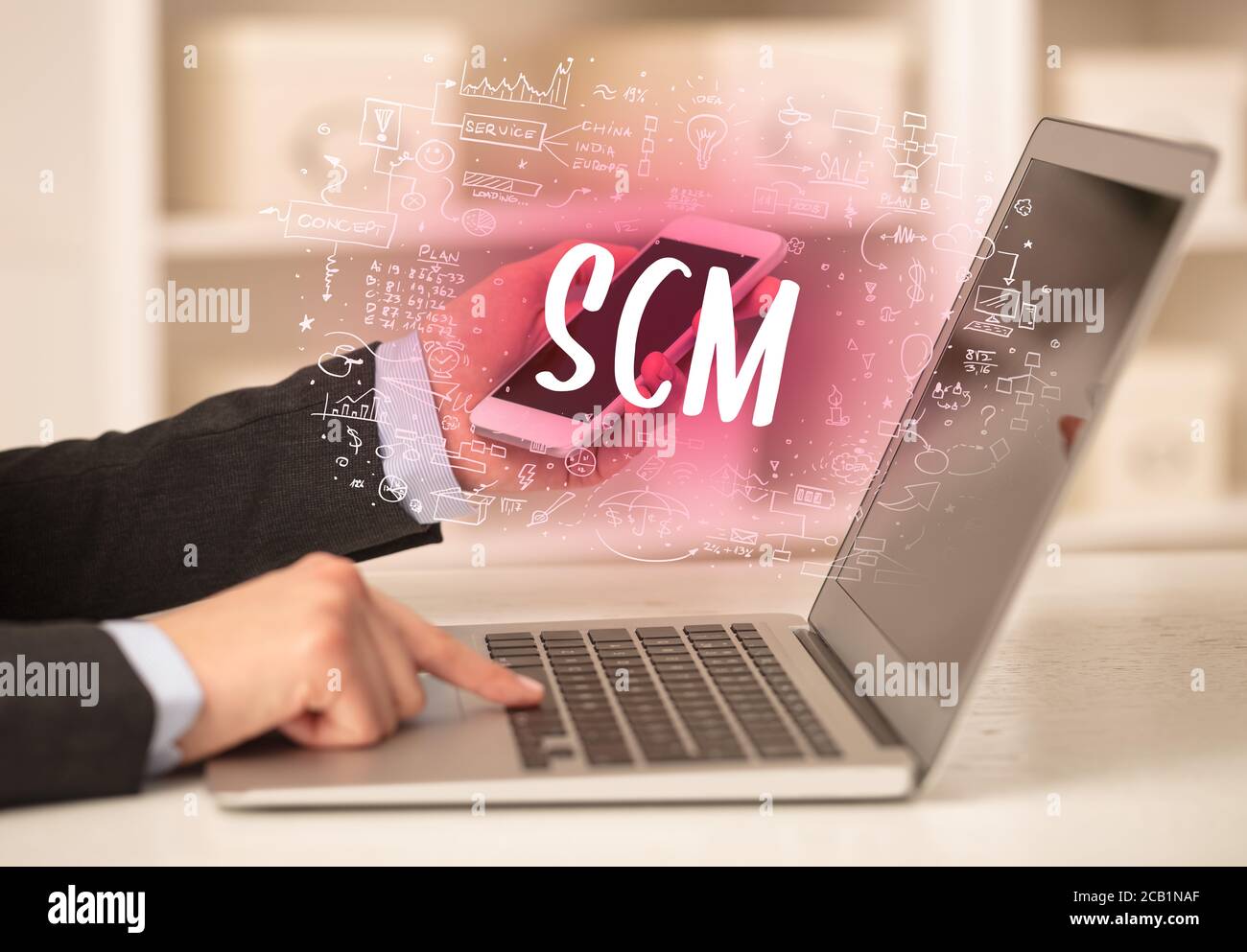 hand working on new modern computer with SCM abbreviation, modern technology concept Stock Photo
