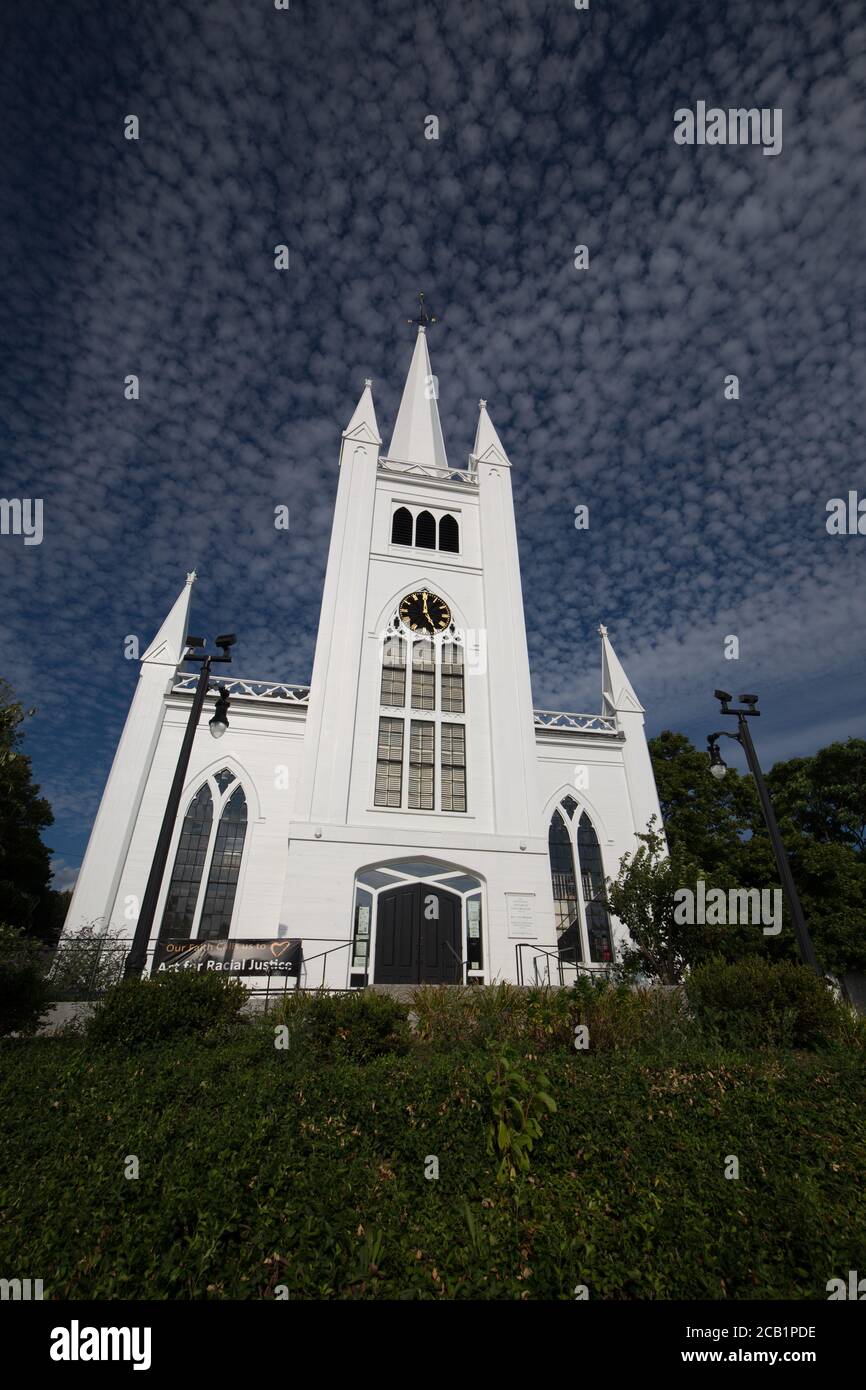 Beautiful church at north andover with bright blue sky and light cumulus cirrus scattered clouds Stock Photo