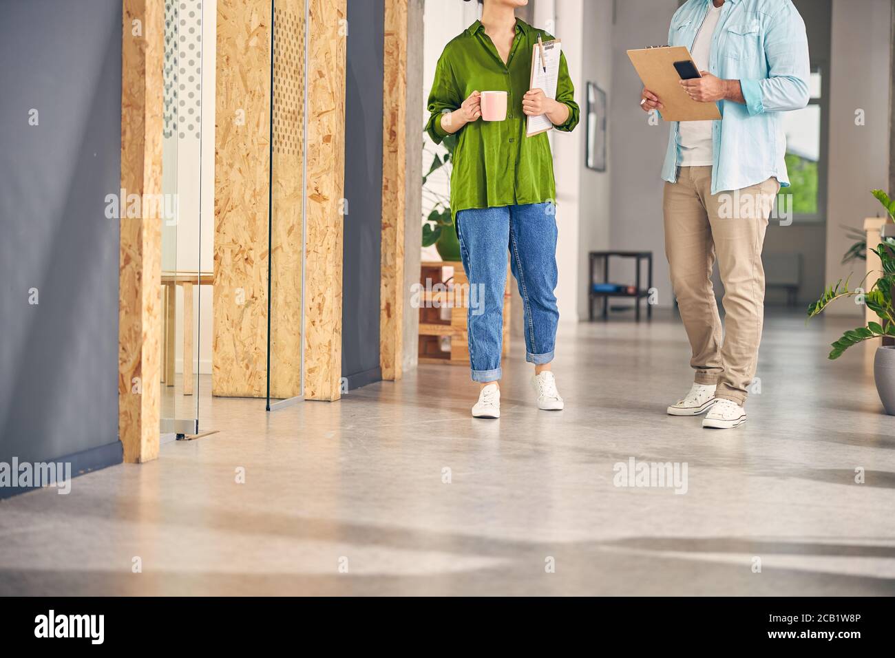 Young female person going to her workplace Stock Photo
