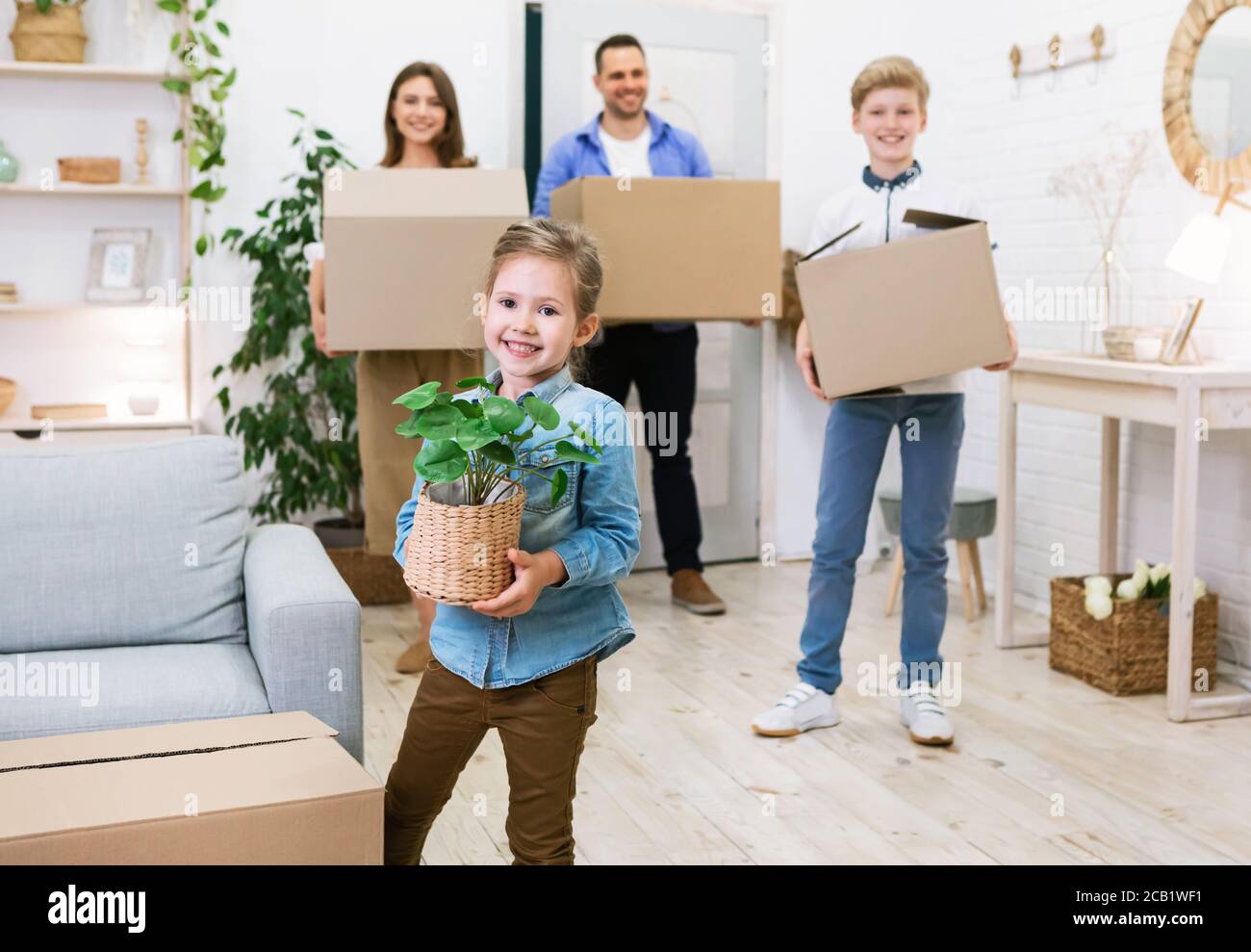 Caucasian girl moving house hi-res stock photography and images - Alamy