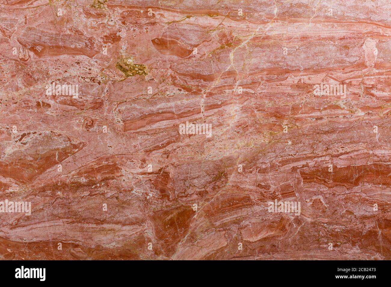 Red marble patterned texture background close-up. Stock Photo