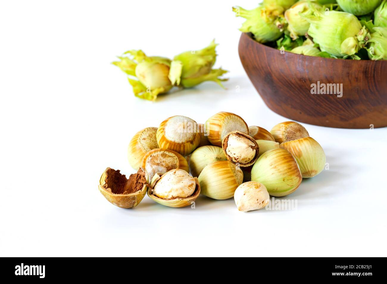 Fresh green hazelnuts (cobnuts) on white background Stock Photo - Alamy