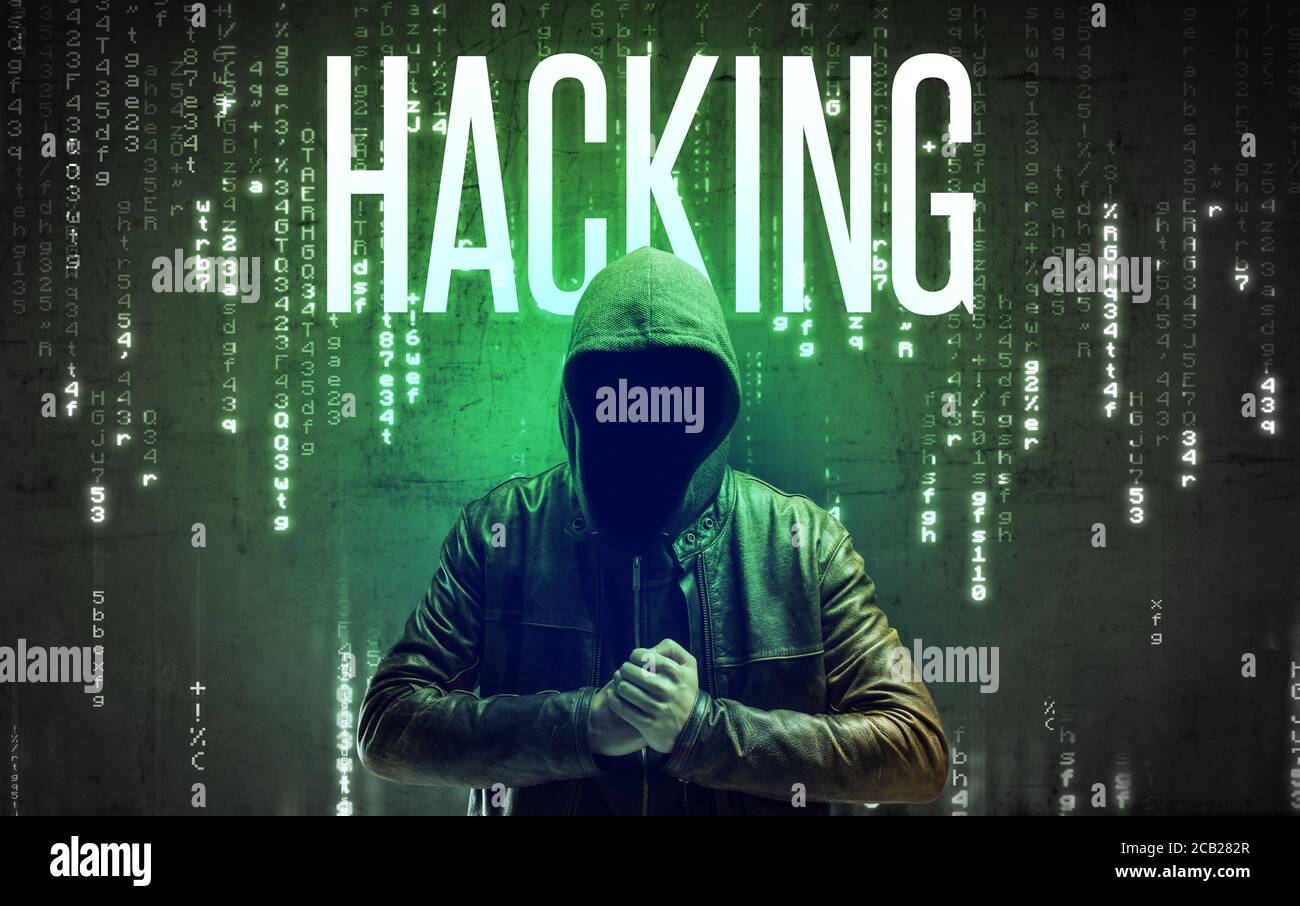 Faceless hacker with HACKING inscription, hacking concept Stock Photo