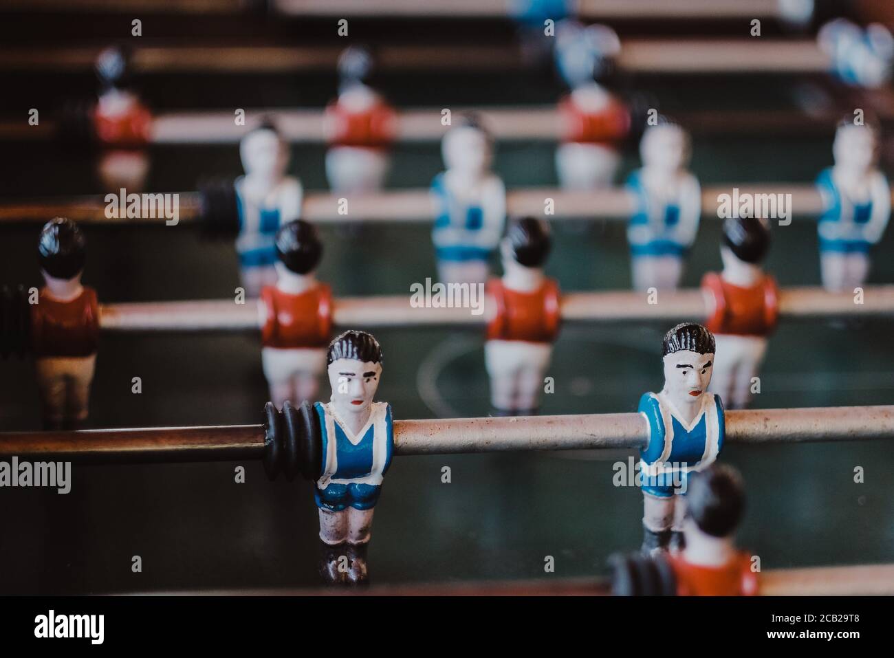 Selective shot of an aged foosball football player figures Stock Photo