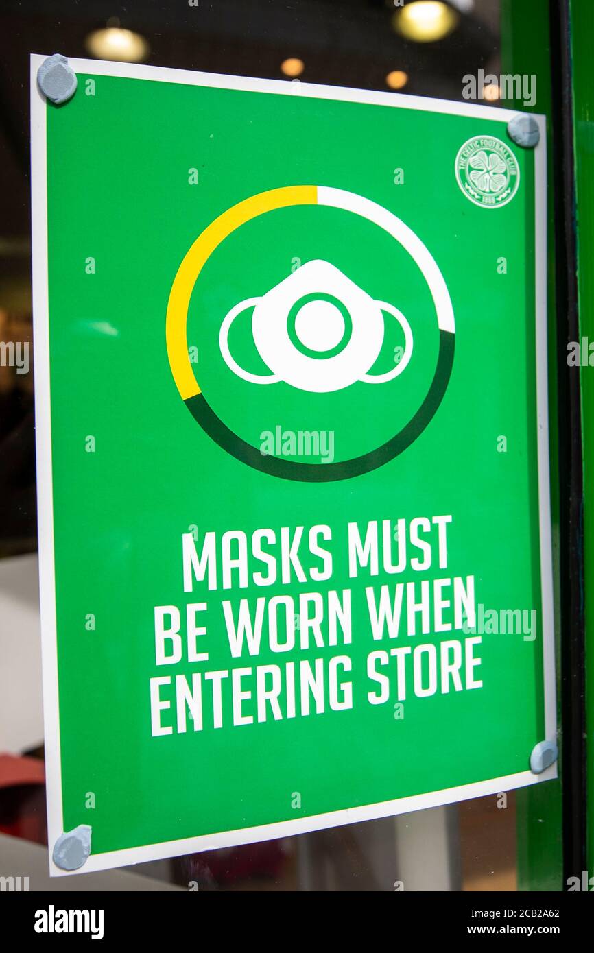 Sign advising customers at Celtic Superstore in Belfast that customers must wear face masks as face coverings are now compulsory for shoppers in Northern Ireland. Stock Photo