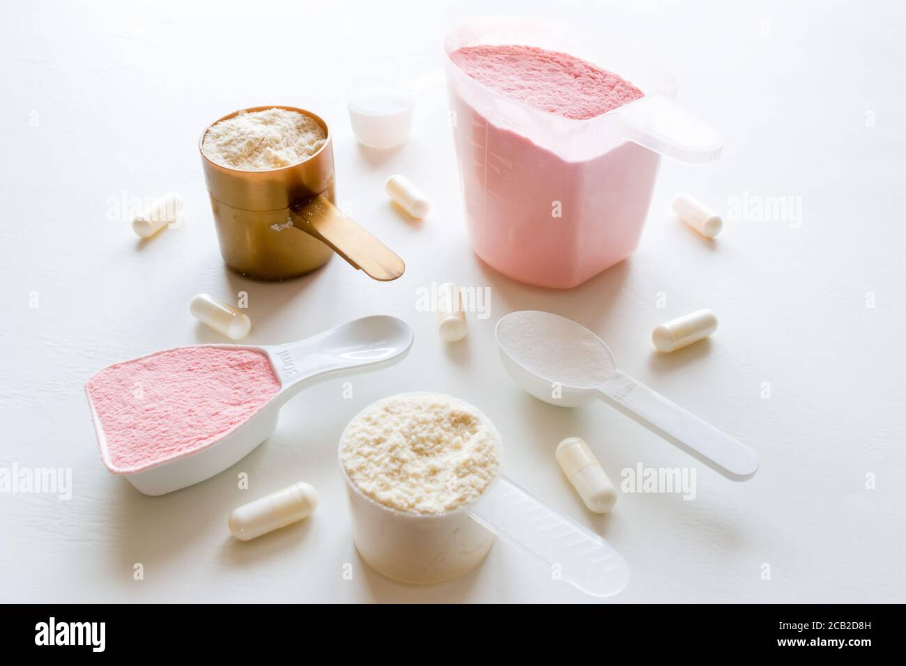 sport supplements protein, gainer, creatine, bcaa on a white background Stock Photo Alamy