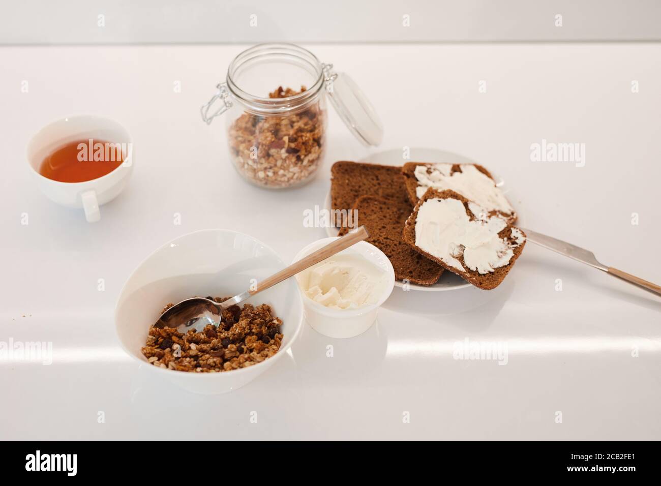 Minimal background image of healthy breakfast ingredients on white