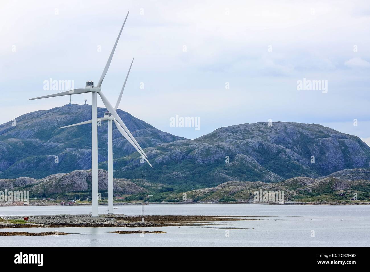 Windgenerators standing along Norwegian coast line in the Bjugn district, Norway Stock Photo