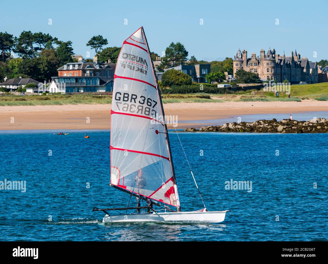 Musto skiff sailing dinghy in West Bay, North Berwick, Firth of Forth, East Lothian, Scotland, UK Stock Photo