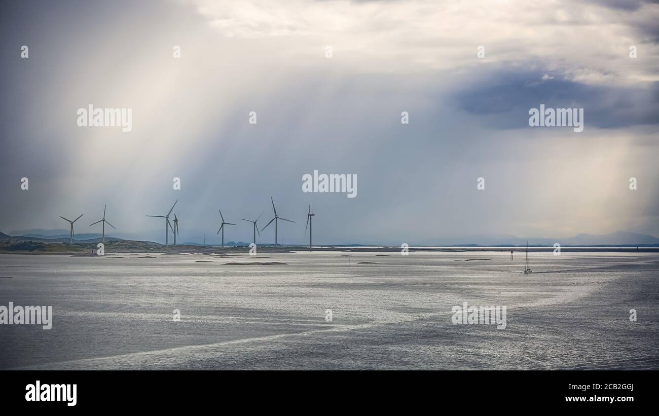 Windgenerators standing along Norwegian coast line in the Bjugn district, Norway Stock Photo