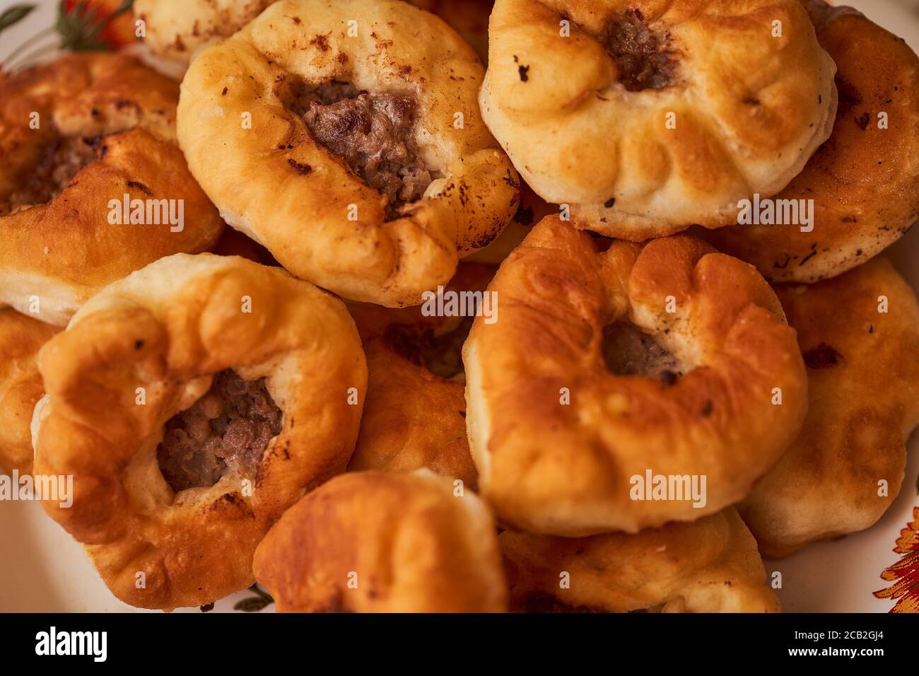 Homemade Meat pies. The traditional Kazakh, Tatar and Bashkir food belyashi. Closeup Stock