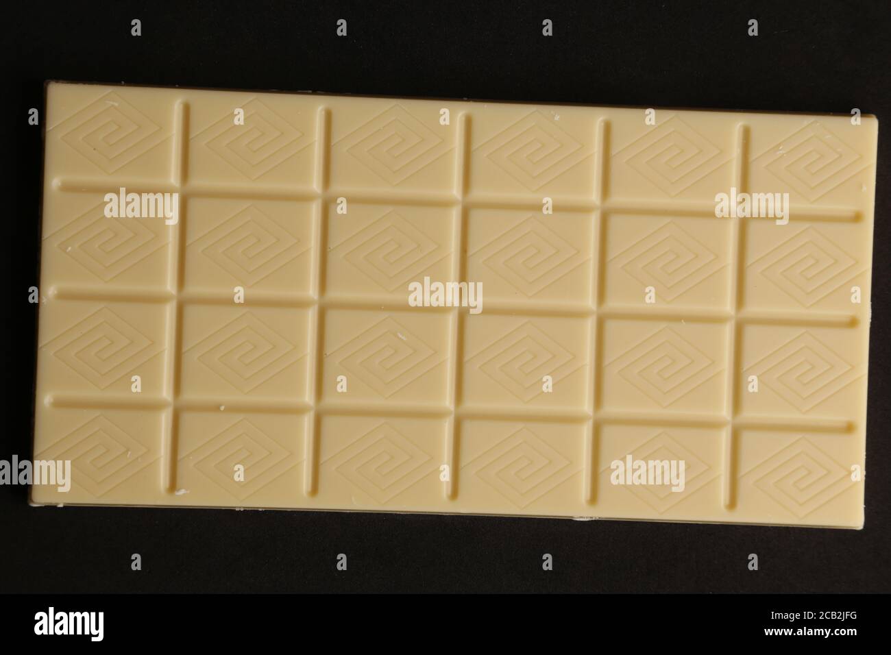 Close up shot of a delicious white chocolate bar Stock Photo - Alamy