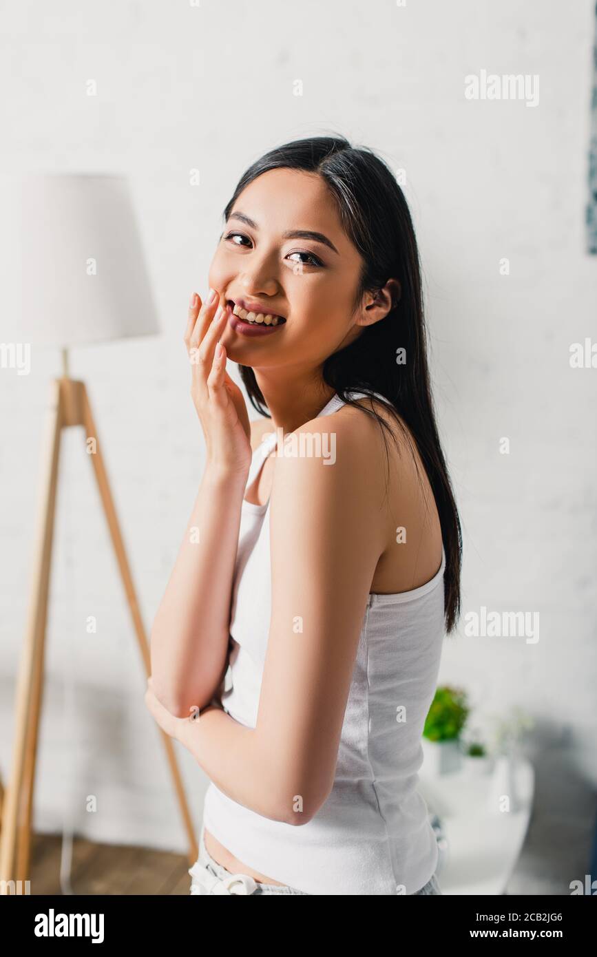 Asian woman smiling hi-res stock photography and images - Alamy