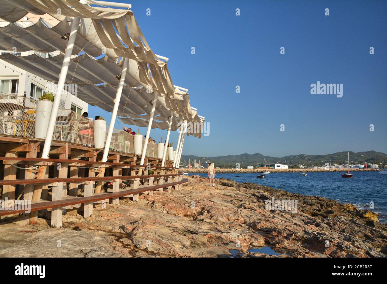 IBIZA, SPAIN - JULY 12, 2017: Cafe del Mar in San Antonio de Portmany on Ibiza island. It is a famous seaside bar with the best views of sunset with c Stock Photo