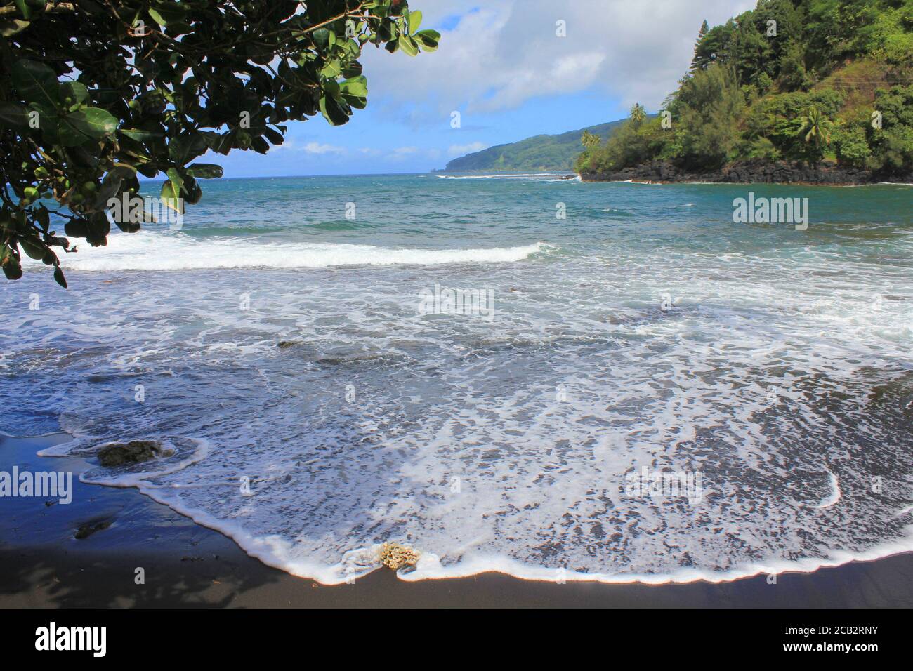 Black sand beach on Tahiti island, French Polynesia. Stock Photo