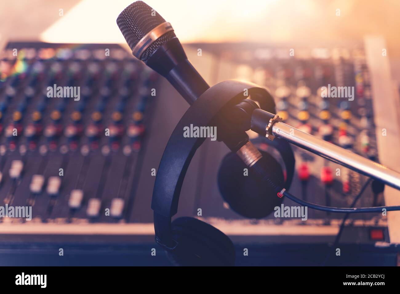 Music instruments or dj concept. The microphone, headphones and sound mixer  background Stock Photo - Alamy