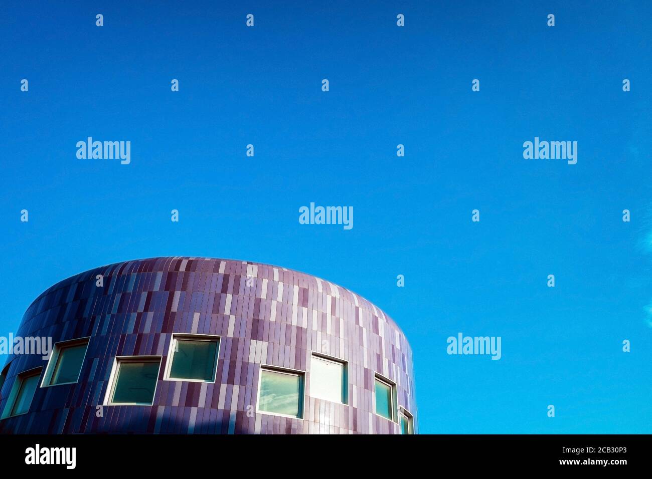 Unusual round building with blue tiles example of modern architecture ...